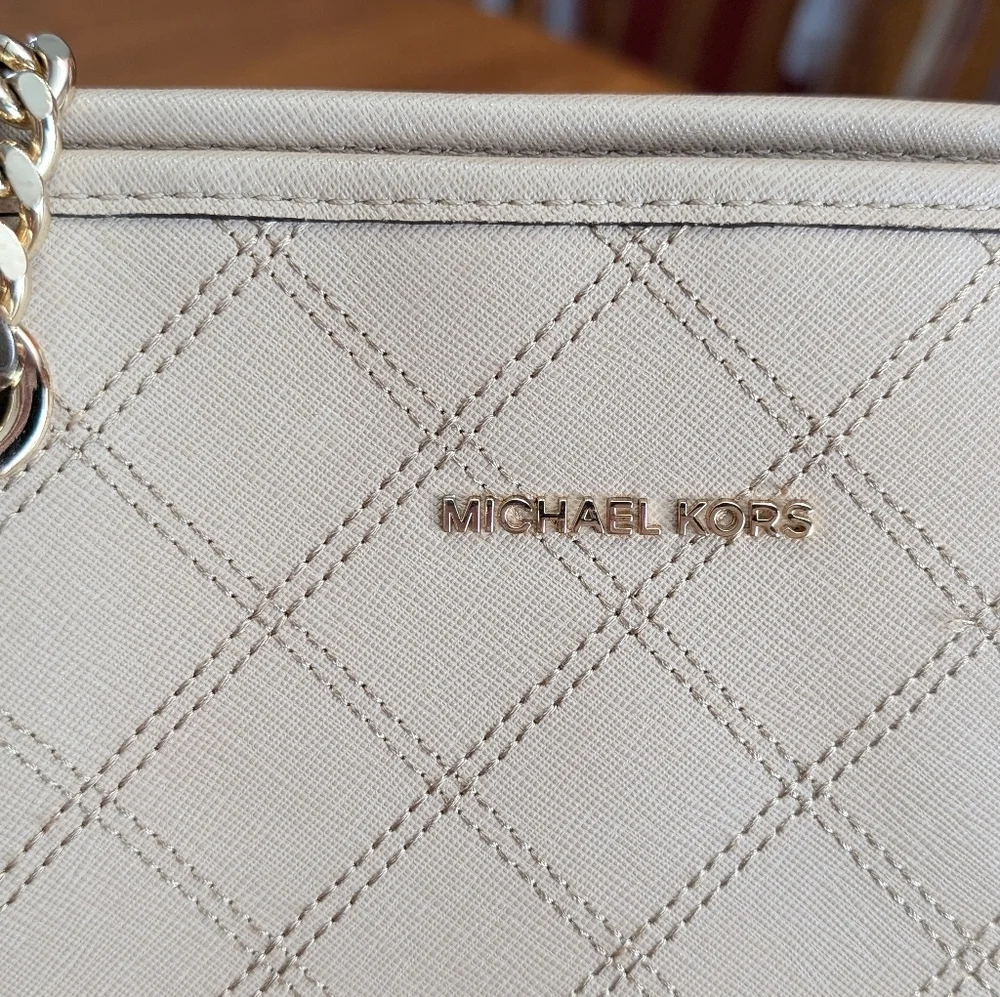 Michael Kors questions leave